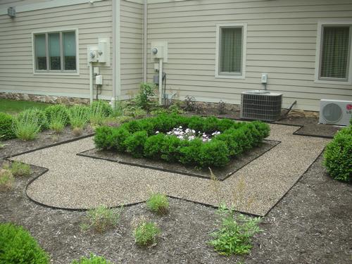 Gravel Lok backyard pebble garden area