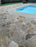 Gravel Lok bonded gravel joints in a flagstone pool deck
