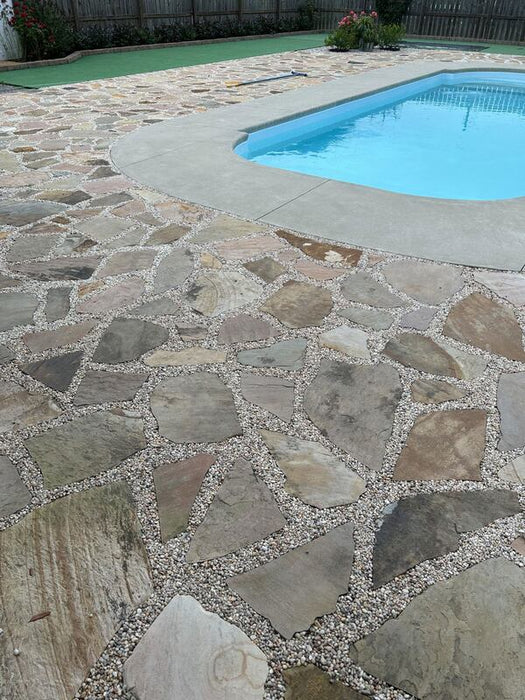 Gravel Lok bonded gravel joints in a flagstone pool deck
