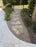 Flagstone stepping stones in Gravel-Lok bonded gravel along a fenced side yard walkway