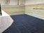 Honeycomb paddock slab ground grid installed in a barn stall
