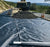Aggregate placed over Mirafi H2Ri geotextile on a road subgrade
