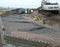 Solmax Miragrid XT geogrid reinforcing a large retaining wall
