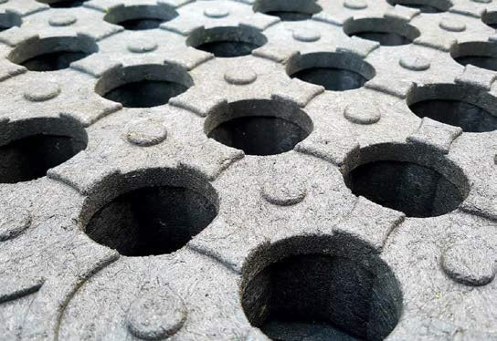 Up Close holes in Mud Control Drainage Grid
